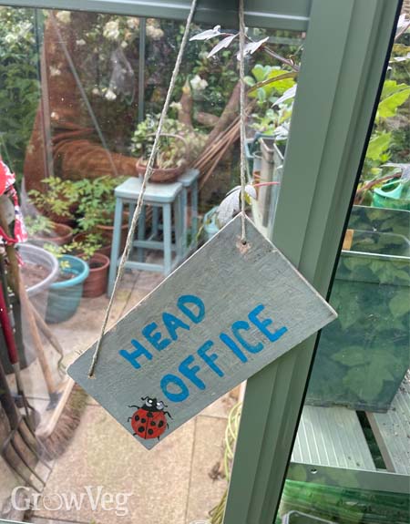 'Head office' greenhouse sign