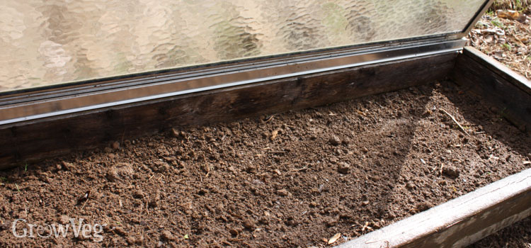 Warming soil with a cold frame