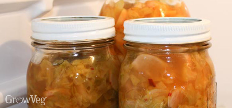 Jars of fermented vegetables in the refrigerator